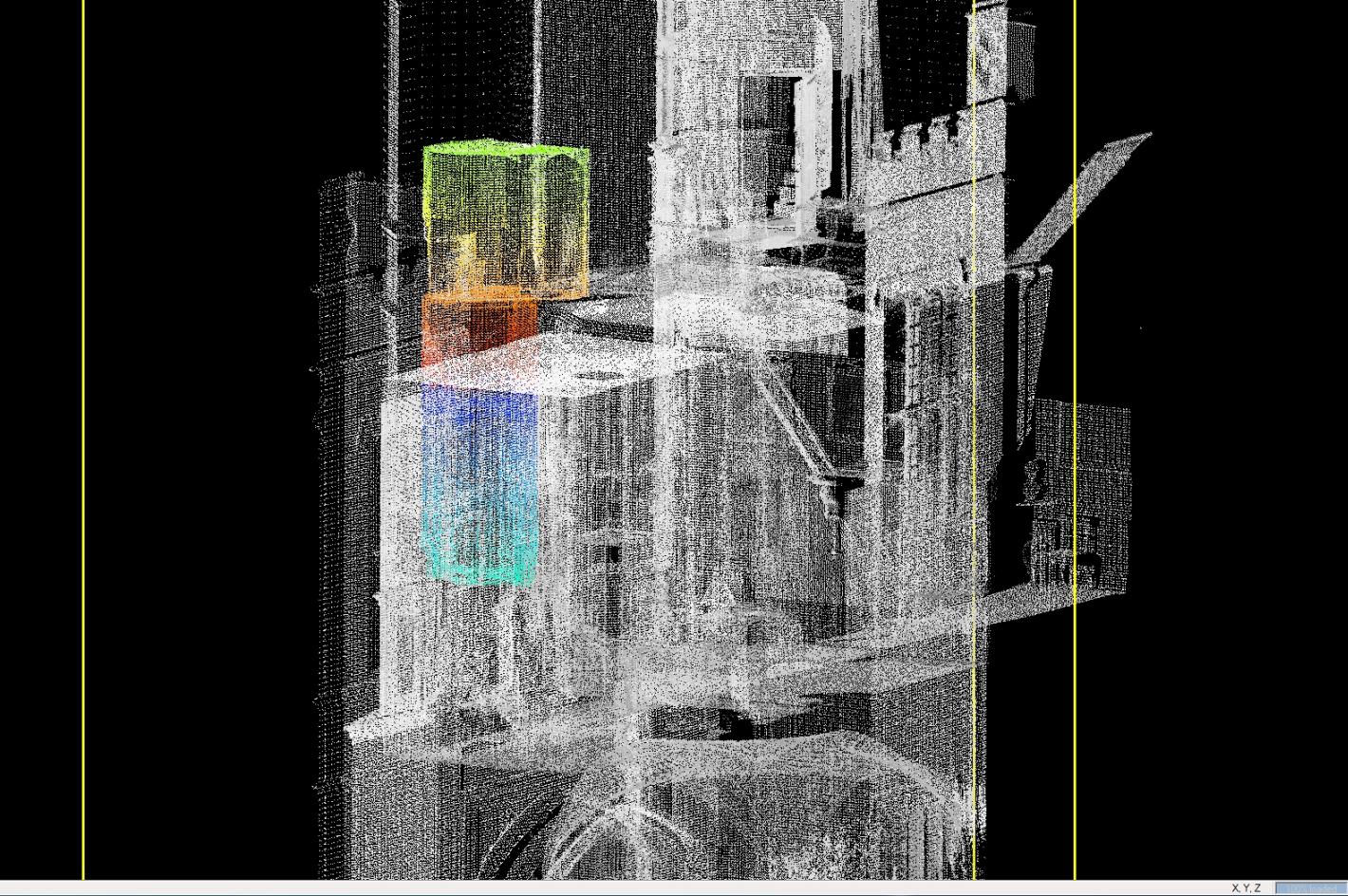 a grey laser scan of a building with a multicoloured section over two floors