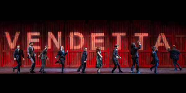 A group of actors on a stage under the word 'Vendetta'