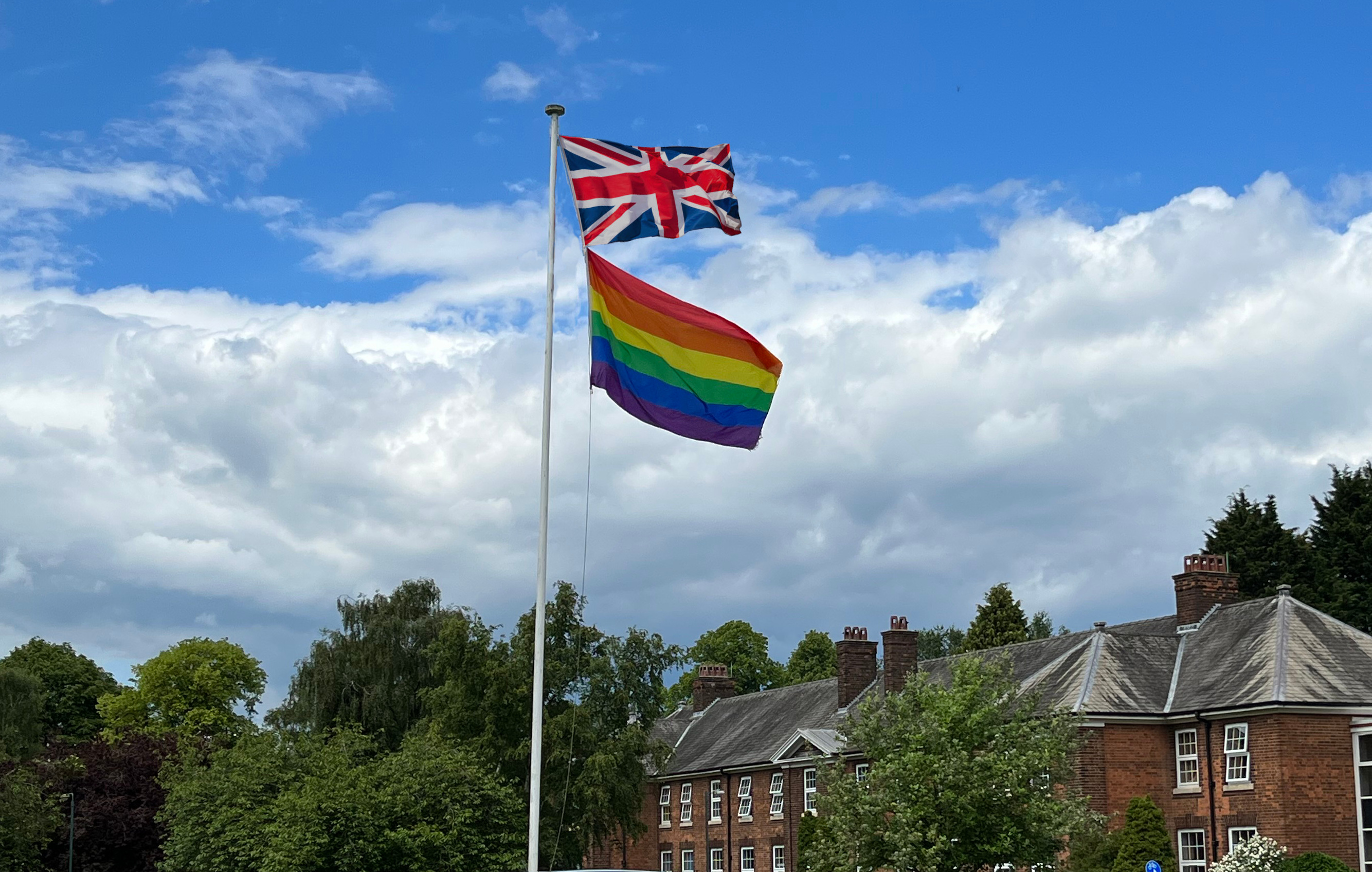 Union Flag and Pride rainbow flag flying over the Sutton Bonington Campus