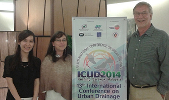 A photograph of Lan, Deonie and Dick at the ICUD 2014