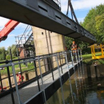 A photograph of a sluice gate undergoes a major inspection and overhaul.