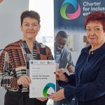 Dr Lorna Treanor at launch event of Charter for Inclusive Entrepreneurship signatory Enterprise Research Centre holding a certificate