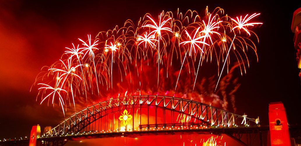 Crackling firework display above the Sydney bridge at New Year