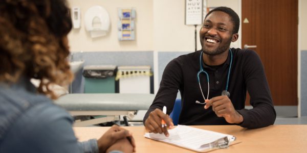 Two medical students talking to each other