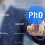 PhD student pushing button about Doctorate of Philosophy concept
