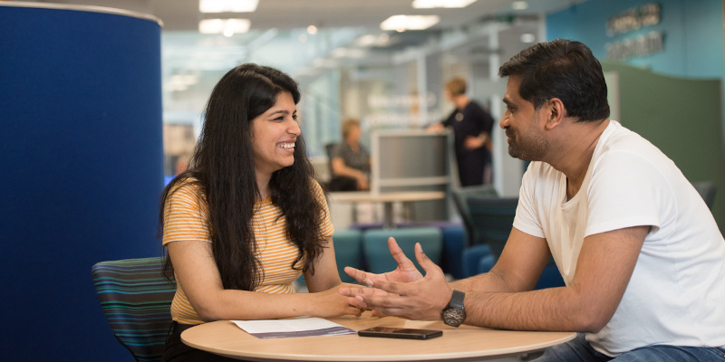 Adviser talking to a student in the Careers Office