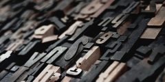 Image shows alphabet printing blocks
