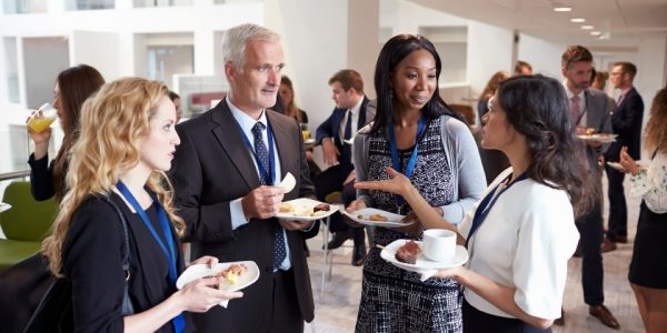 Group of people networking at an event