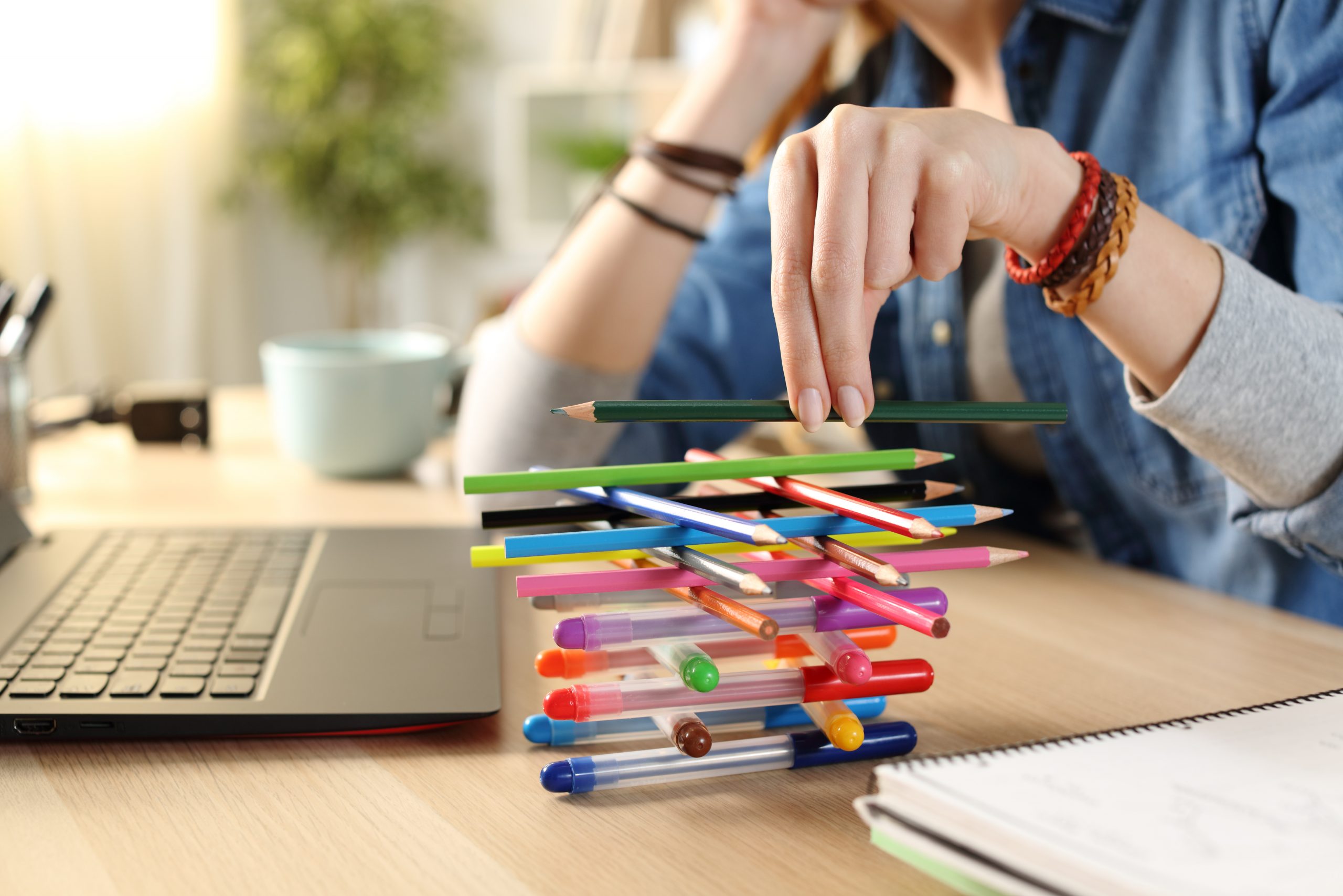 Stacking pens and delaying time on tasks they should be doing