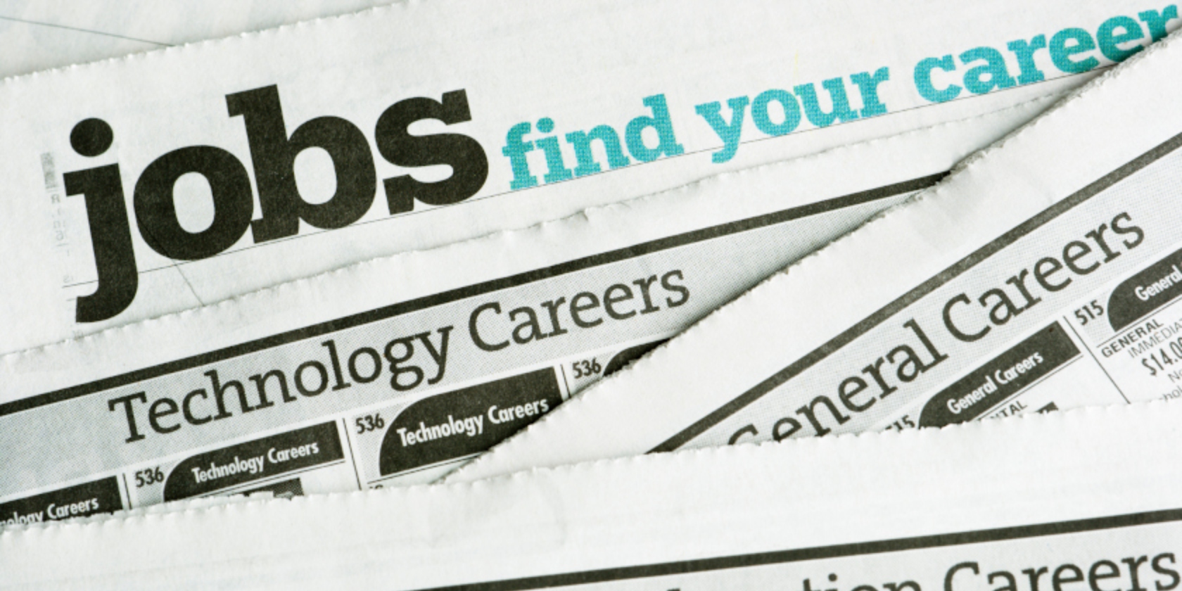 Close up of newspaper with the phrase 'Jobs find your career' across it.