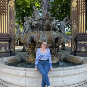 Lauren Ogden in front of a water feature in France