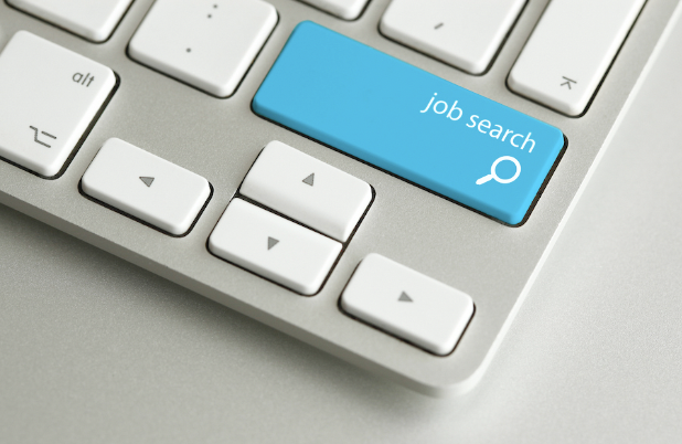 Close up of a Mac keyboard with the text 'job search' on the keys