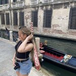 Me standing in front of a gondola in Venice. I used the opportunity to do some exploring within Italy