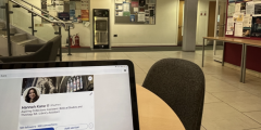 Laptop on a table showing a student LinkedIn profile