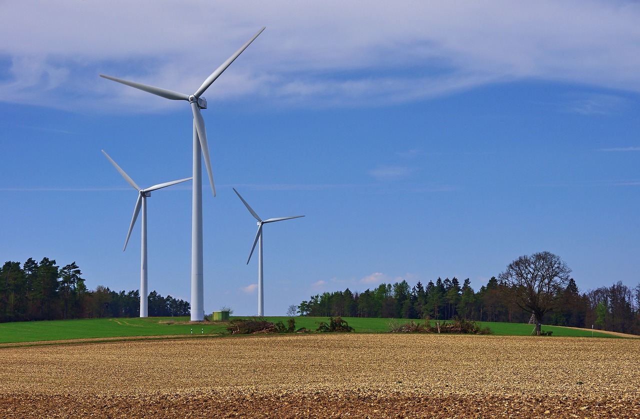 Three windmills in the countryside