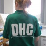 DHC Volunteer shirt modelled by student volunteer.