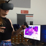 Aja Ireland tests the VR environment using the Oculus Rift.
