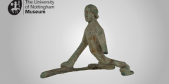 A screengrab of a 3D model of a sphinx figurine