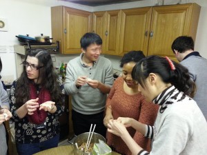 Li Guan (Grace) was teaching Happiness how to make Jiao Zi (dumpling)...