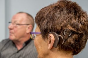 Person wearing a cochlear implant