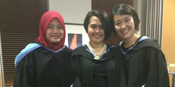 Korean student Kuemju with friends before graduation