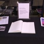 Display table with handouts and guestbook