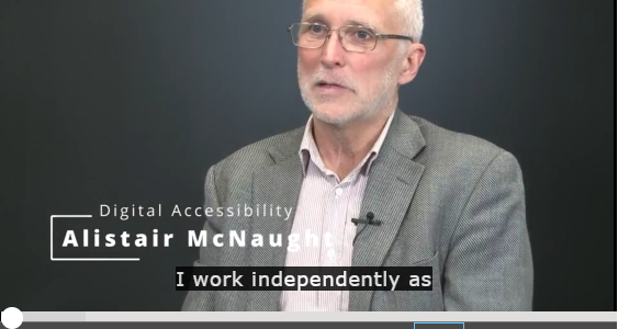 Still from Alistair McNaught's video, captioned