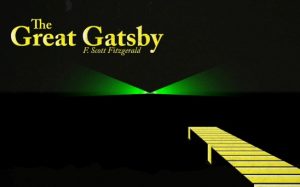 The front cover of The Great Gatsby book showing a jetty and a green light in the distance