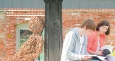 Students reading in the walled garden