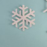 Paper snowflakes on a blue background