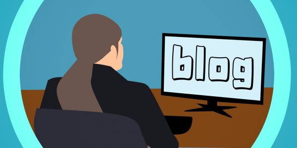 stylised picture of woman sitting at desk looking at computer screen saying 'Blog'
