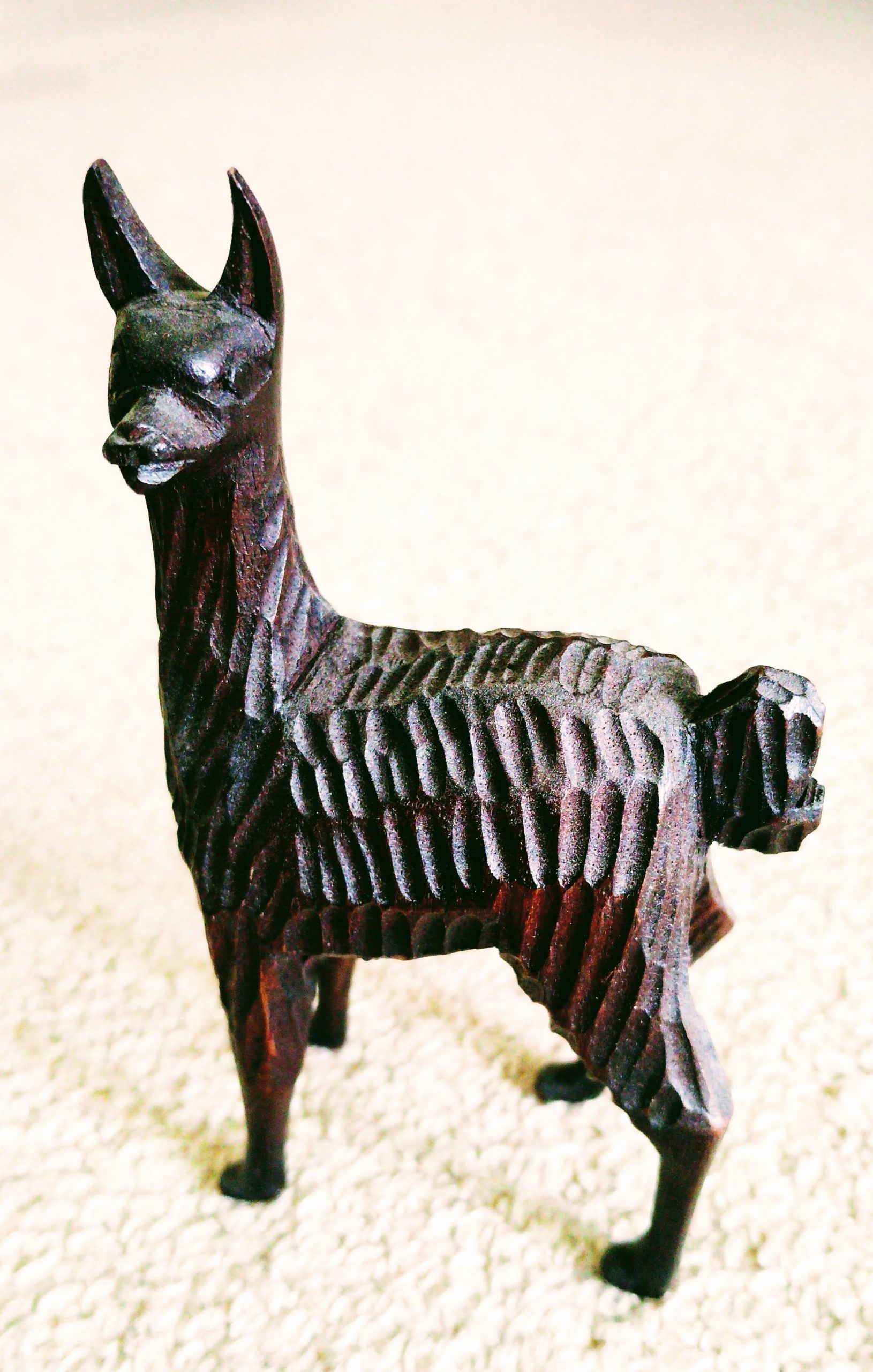 wooden carved llama from Machu Picchu