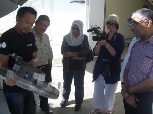 Explaining how the drone works(left to right) Lim Wee Siong - MEME's conservation drone specialist (Research Associate at UNMC); Dato' Abd Rasid Samsudi - Director General, Department of Wildlife and National Parks Peninsular Malaysia; Datuk Misliah Mohd Basir - Deputy Director General, Department of Wildlife and National Parks Peninsular Malaysia; Lindsay Brooke (UoN Media Relations Manager; En Mohd Nawayai bin Yasak (almost hidden)  - Director of Biodiversity Conservation Division, Department of Wildlife and National Parks Peninsular Malaysia; Dr Sivananthan Elagupillay  - Director of Ecotourism Division, Department of Wildlife and National Parks Peninsular Malaysia