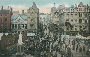 Colourised postcard showing crowds at Goose Fair in Market Square, Nottingham