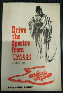 Drive the Spectre from Wales pamphlet with a picture of the Grim Reaper over a village