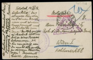 Reverse of the postcard with text written in black ink in German on the left and the postmarks and address on the right.