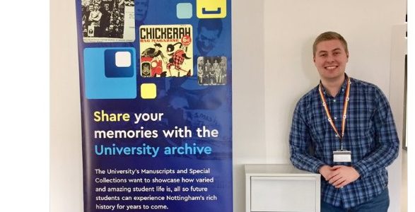 Photo of SU Communities Officer with the Archive Collecting Box