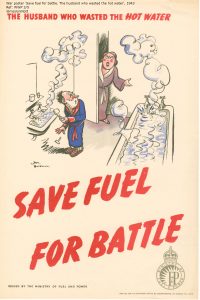 Save Fuel for Battle: The husband who wasted the hot water. Depicts a man running a very full hot bath and shaving at a sink with the taps running, watched angrily by his wife.