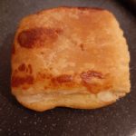 Close up of a cooked cheese roll