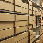 Shelves containing boxes of archives