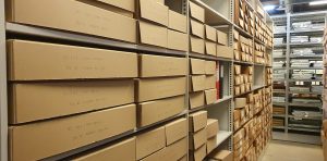 Shelves containing boxes of archives