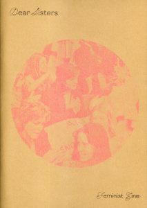 Dear Sisters zine cover - orange with pink image of women activists.