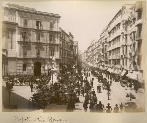 Photograph number 86 in Carrie North's photograph album (MS 183); the original is undated but probably c.1880-1900; captioned 'Napoli. Via Roma.'