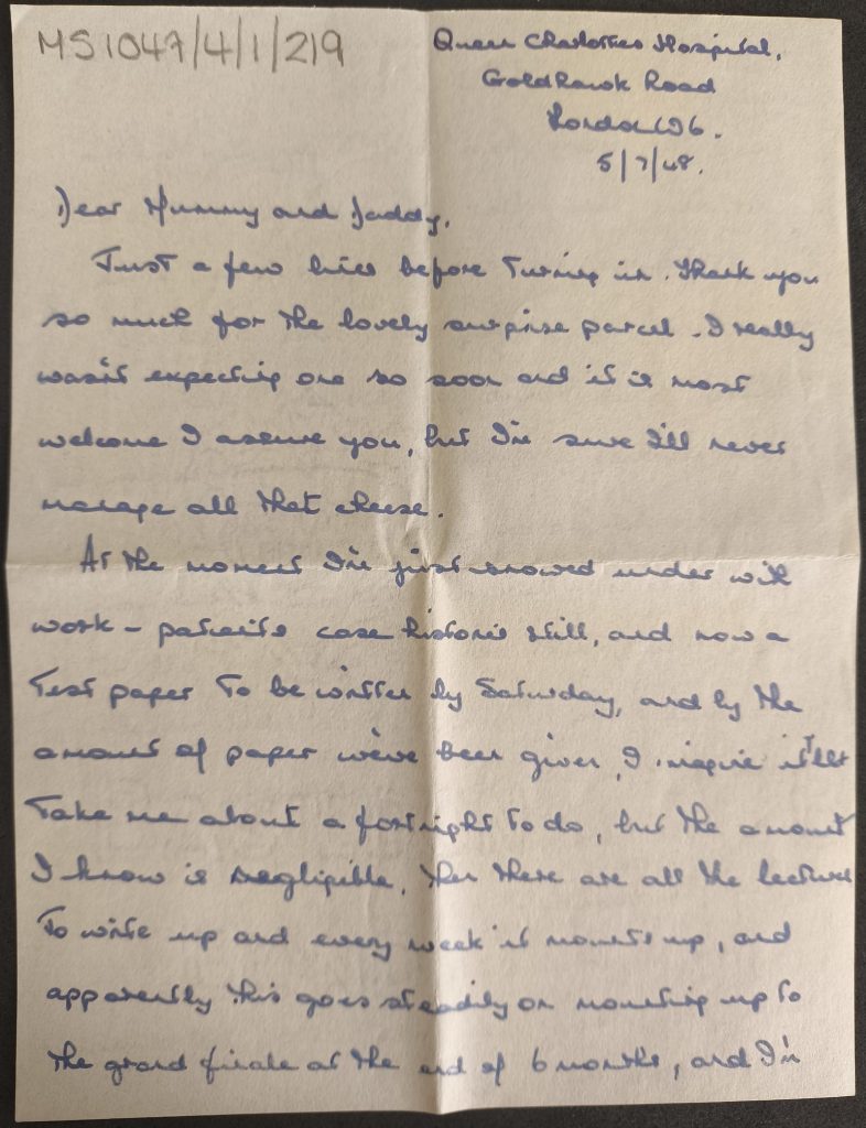 Handwritten letter, blue ink on white paper.