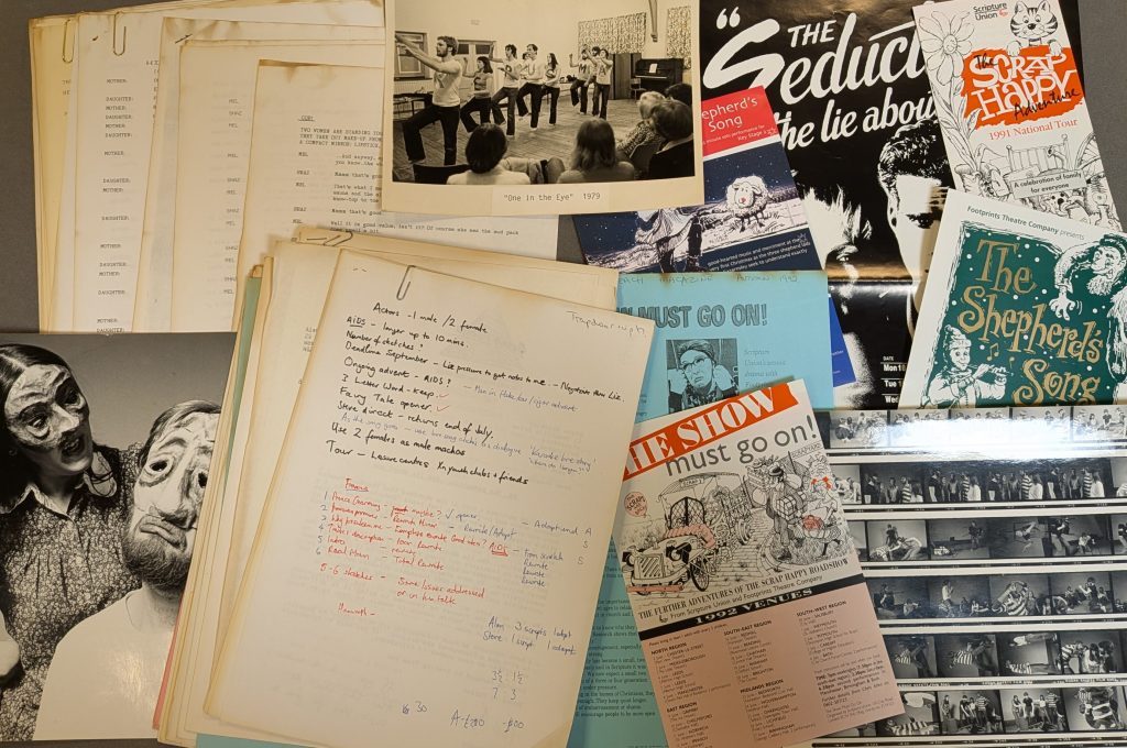 Photograph of an assortment of handwritten notes, printed scripts, flyers, posters, and photographs.