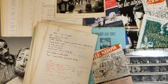 Photograph of an assortment of handwritten notes, printed scripts, flyers, posters, and photographs.
