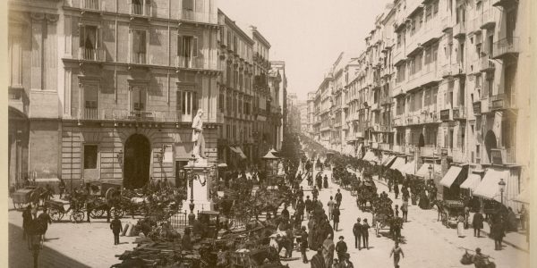 Photograph number 86 in Carrie North's photograph album (MS 183); the original is undated but probably c.1880-1900; captioned 'Napoli. Via Roma.'