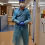 Professor Dominick Shaw wearing full PPE
