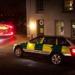Community First Responders car outside a university building at night