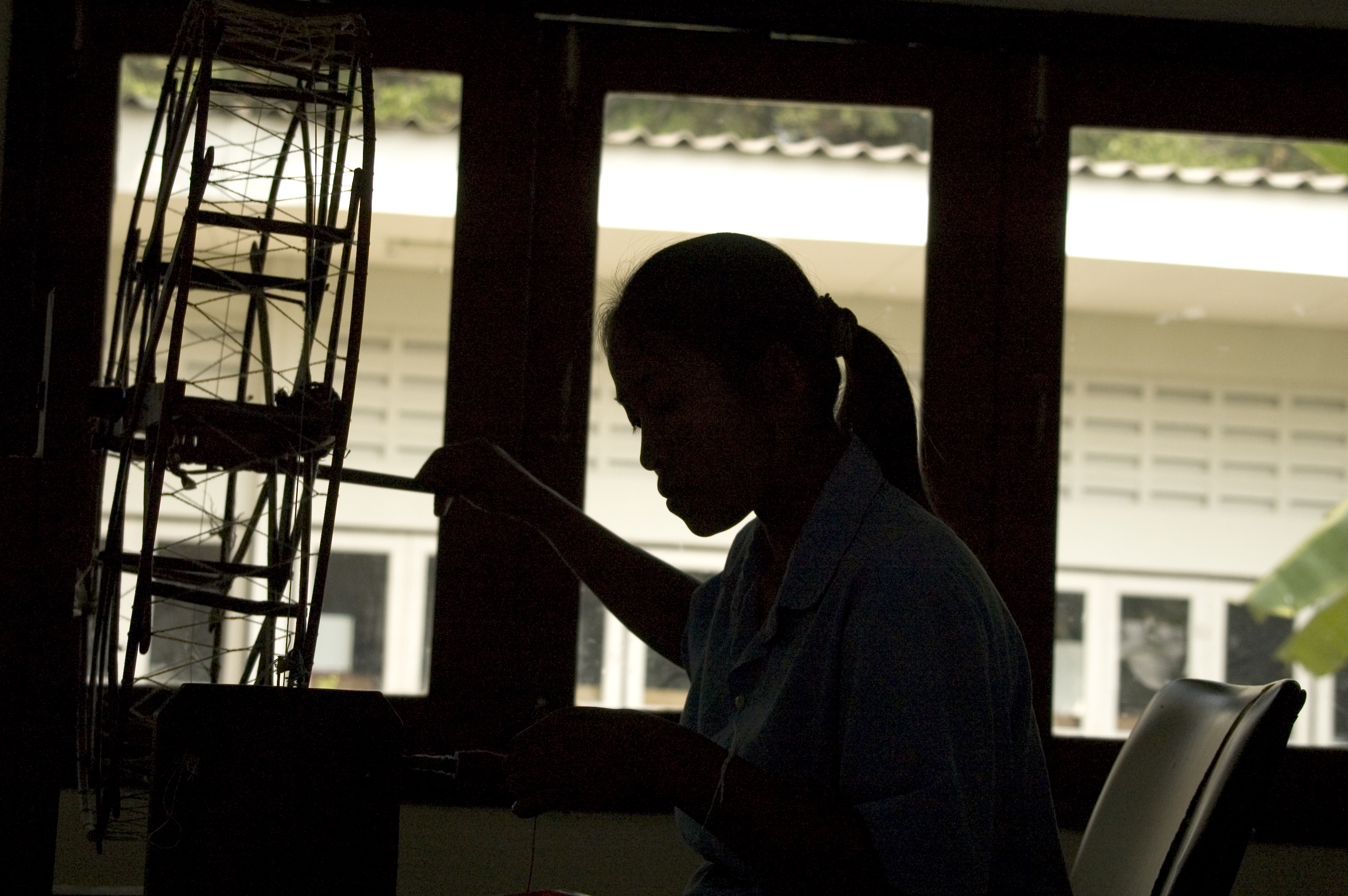 Slave in Thailand Factory, 2005. Kay Chernush for the U.S. State Department.